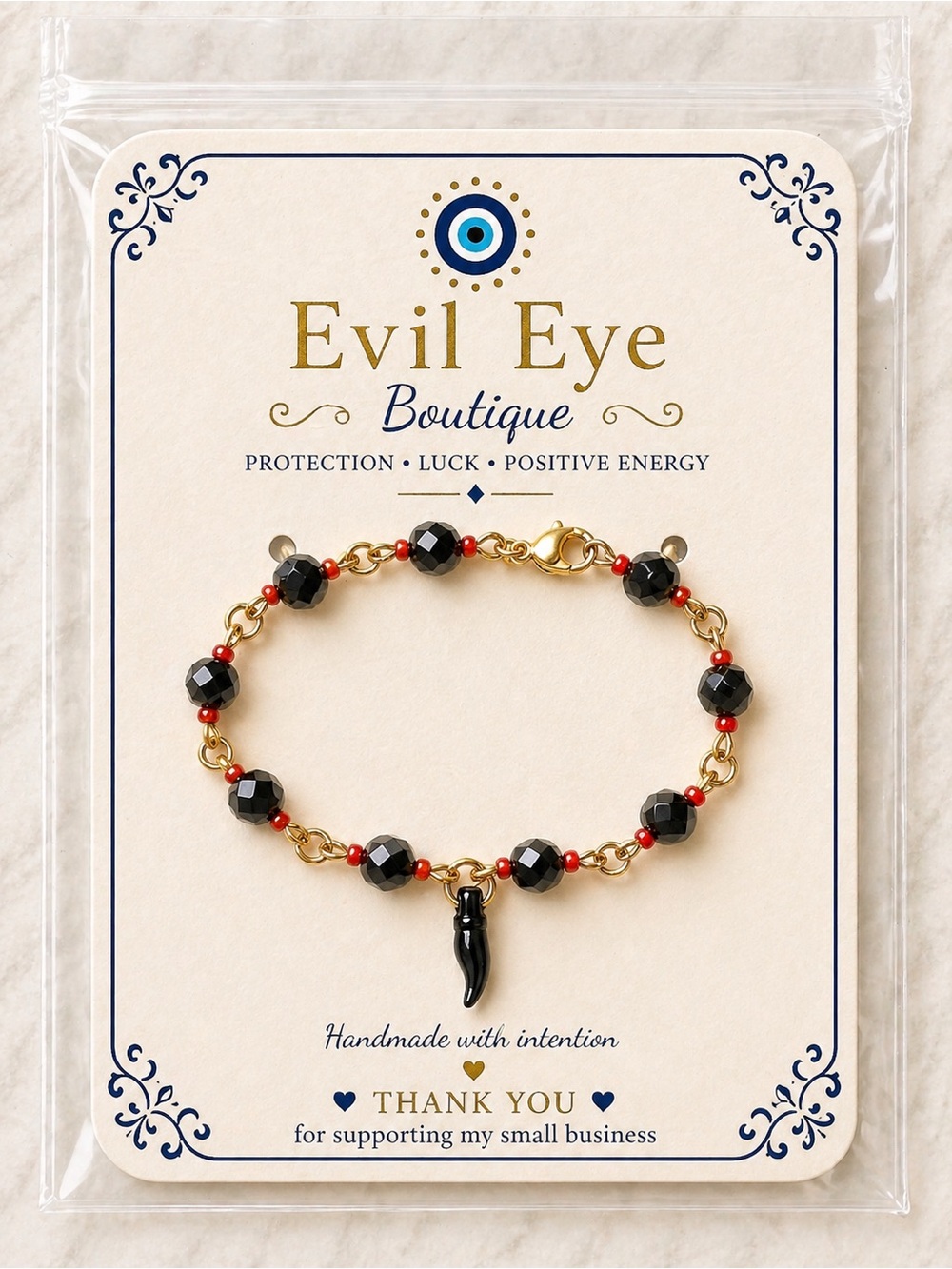 Gold Bracelet with Black Beads and Red Accents